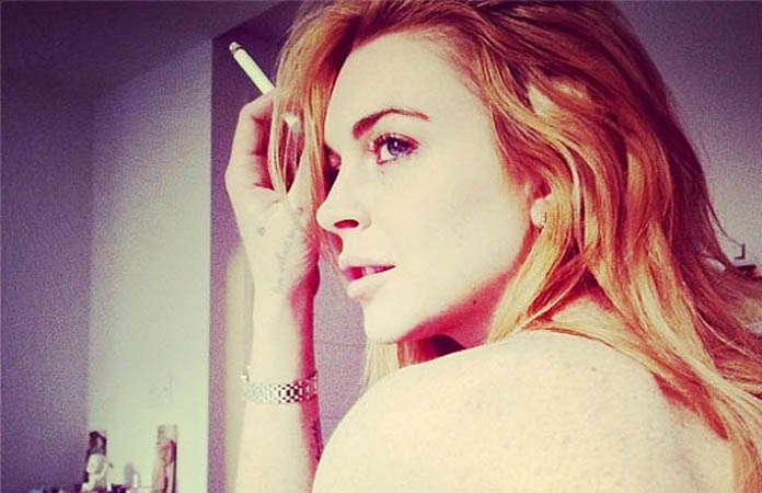 Lindsay Lohan publicó fotografía en ‘topless’